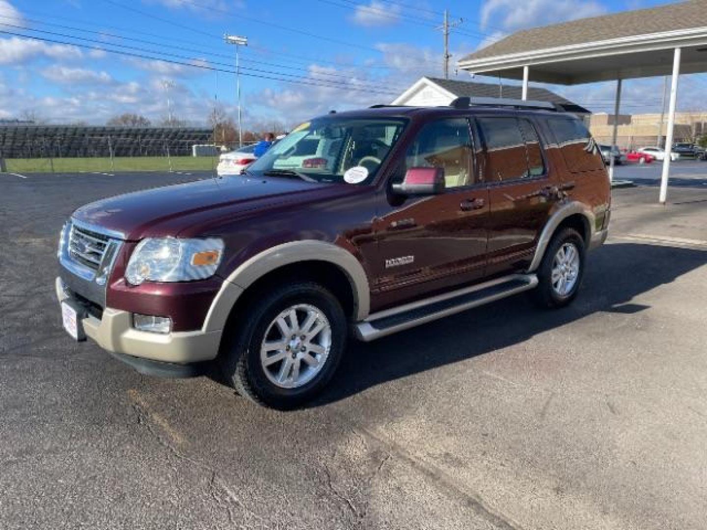 2007 Dark Cherry Metallic Ford Explorer Eddie Bauer 4.0L 4WD (1FMEU74E77U) with an 4.0L V6 SOHC 16V engine, 5-Speed Automatic transmission, located at 880 E. National Road, Vandalia, OH, 45377, (937) 908-9800, 39.892189, -84.181015 - Photo#1