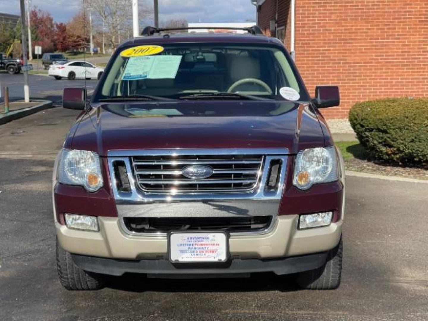 2007 Dark Cherry Metallic Ford Explorer Eddie Bauer 4.0L 4WD (1FMEU74E77U) with an 4.0L V6 SOHC 16V engine, 5-Speed Automatic transmission, located at 880 E. National Road, Vandalia, OH, 45377, (937) 908-9800, 39.892189, -84.181015 - Photo#2