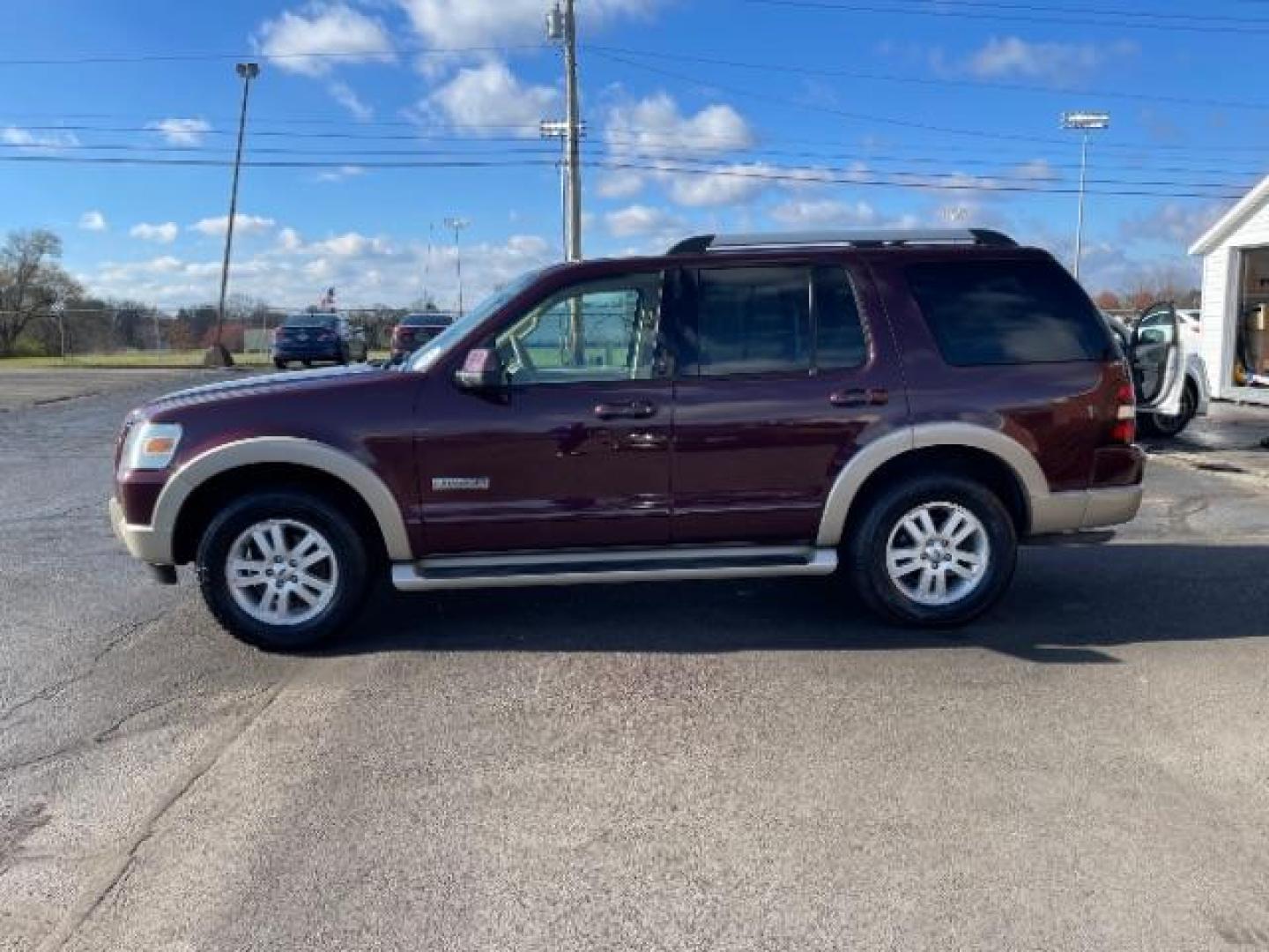 2007 Dark Cherry Metallic Ford Explorer Eddie Bauer 4.0L 4WD (1FMEU74E77U) with an 4.0L V6 SOHC 16V engine, 5-Speed Automatic transmission, located at 880 E. National Road, Vandalia, OH, 45377, (937) 908-9800, 39.892189, -84.181015 - Photo#3