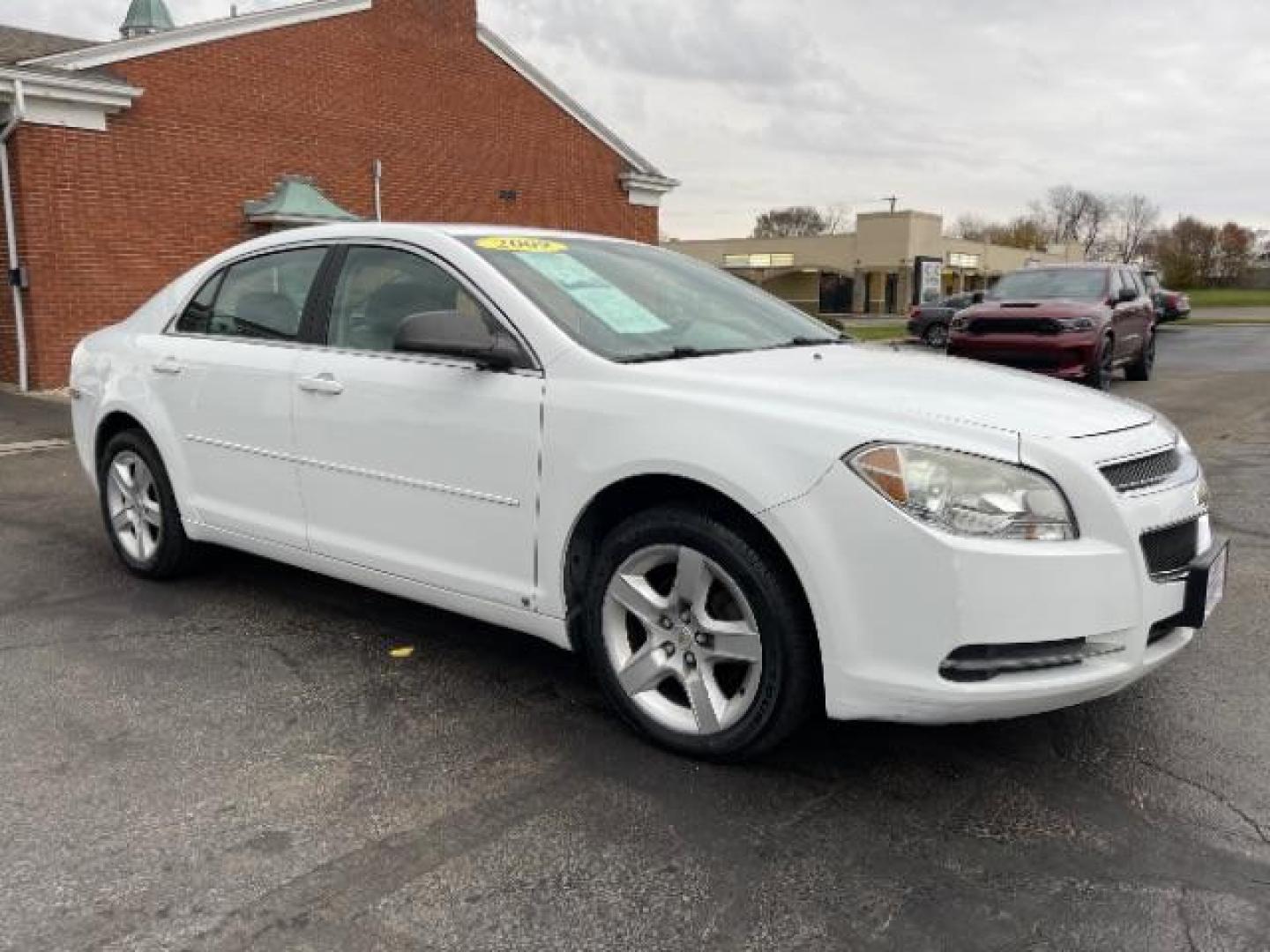 2009 Summit White Chevrolet Malibu LS (1G1ZG57B69F) with an 2.4L L4 DOHC 16V engine, 4-Speed Automatic transmission, located at 1230 East Main St, Xenia, OH, 45385, (937) 908-9800, 39.687321, -83.910294 - Photo#0