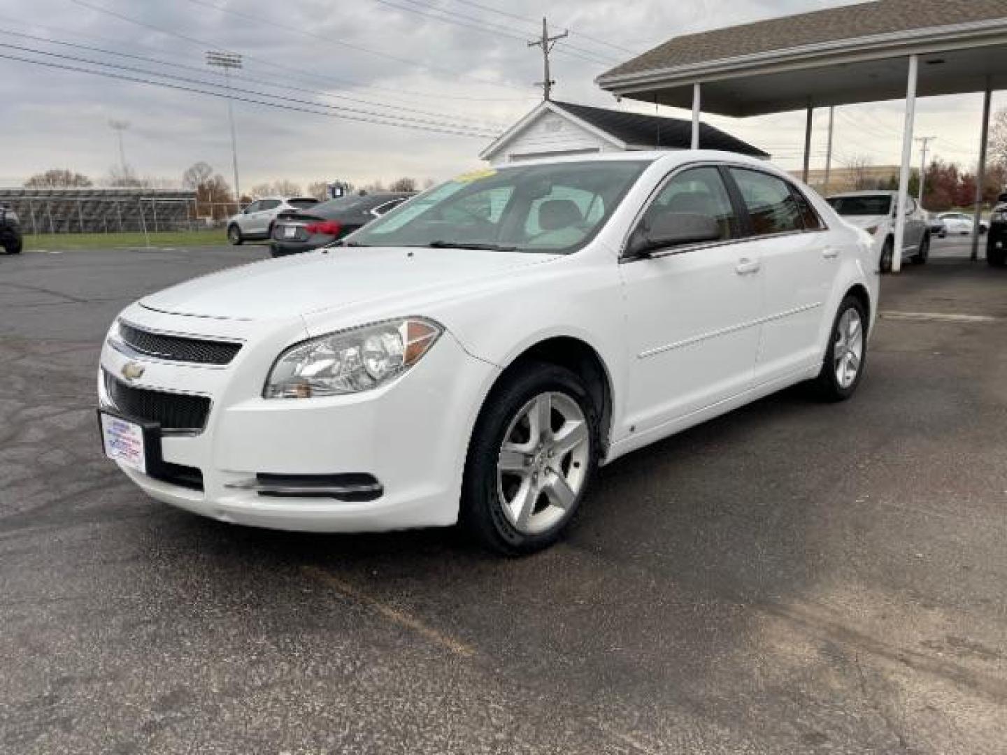 2009 Summit White Chevrolet Malibu LS (1G1ZG57B69F) with an 2.4L L4 DOHC 16V engine, 4-Speed Automatic transmission, located at 1230 East Main St, Xenia, OH, 45385, (937) 908-9800, 39.687321, -83.910294 - Photo#1