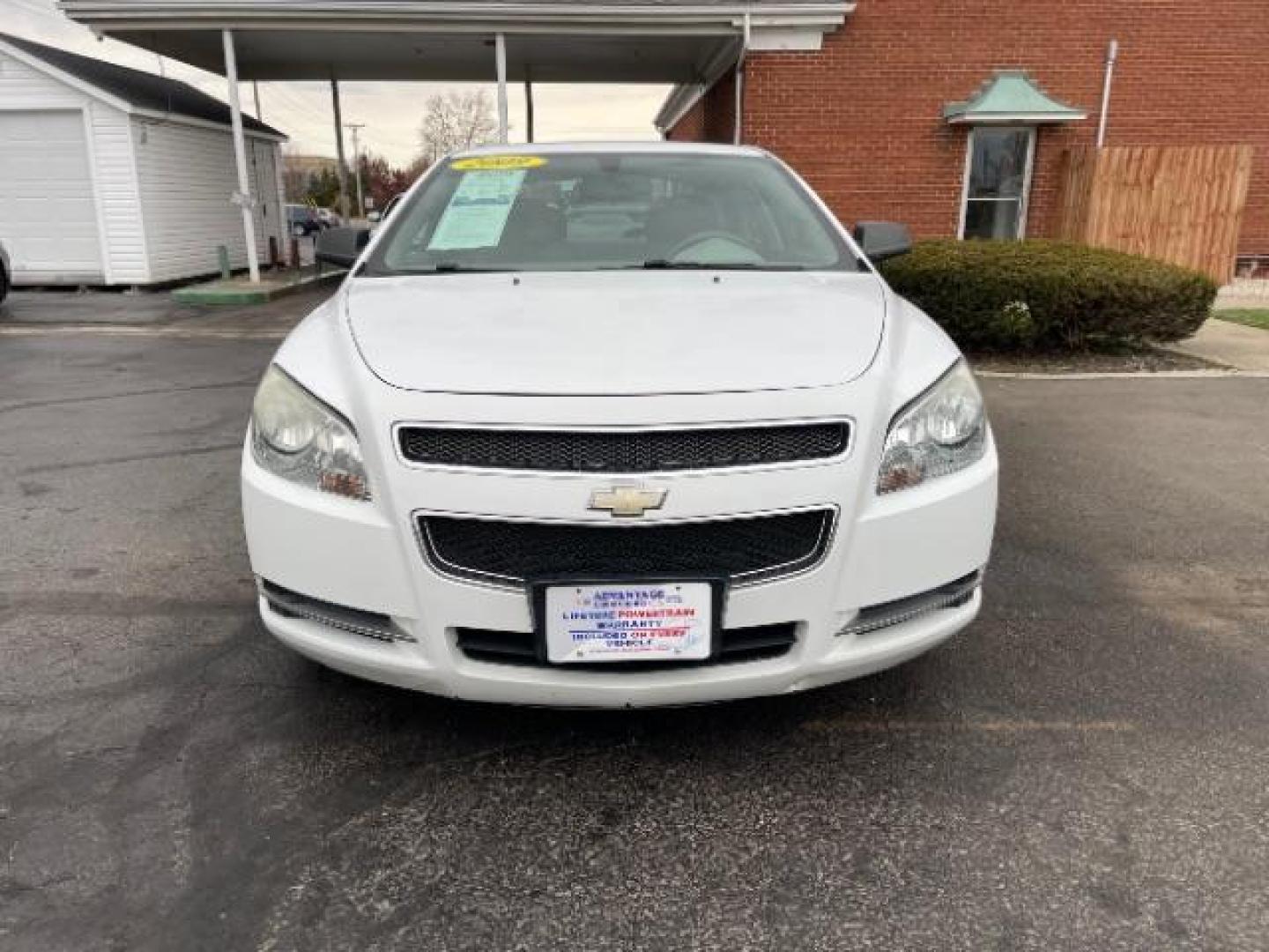 2009 Summit White Chevrolet Malibu LS (1G1ZG57B69F) with an 2.4L L4 DOHC 16V engine, 4-Speed Automatic transmission, located at 1230 East Main St, Xenia, OH, 45385, (937) 908-9800, 39.687321, -83.910294 - Photo#4