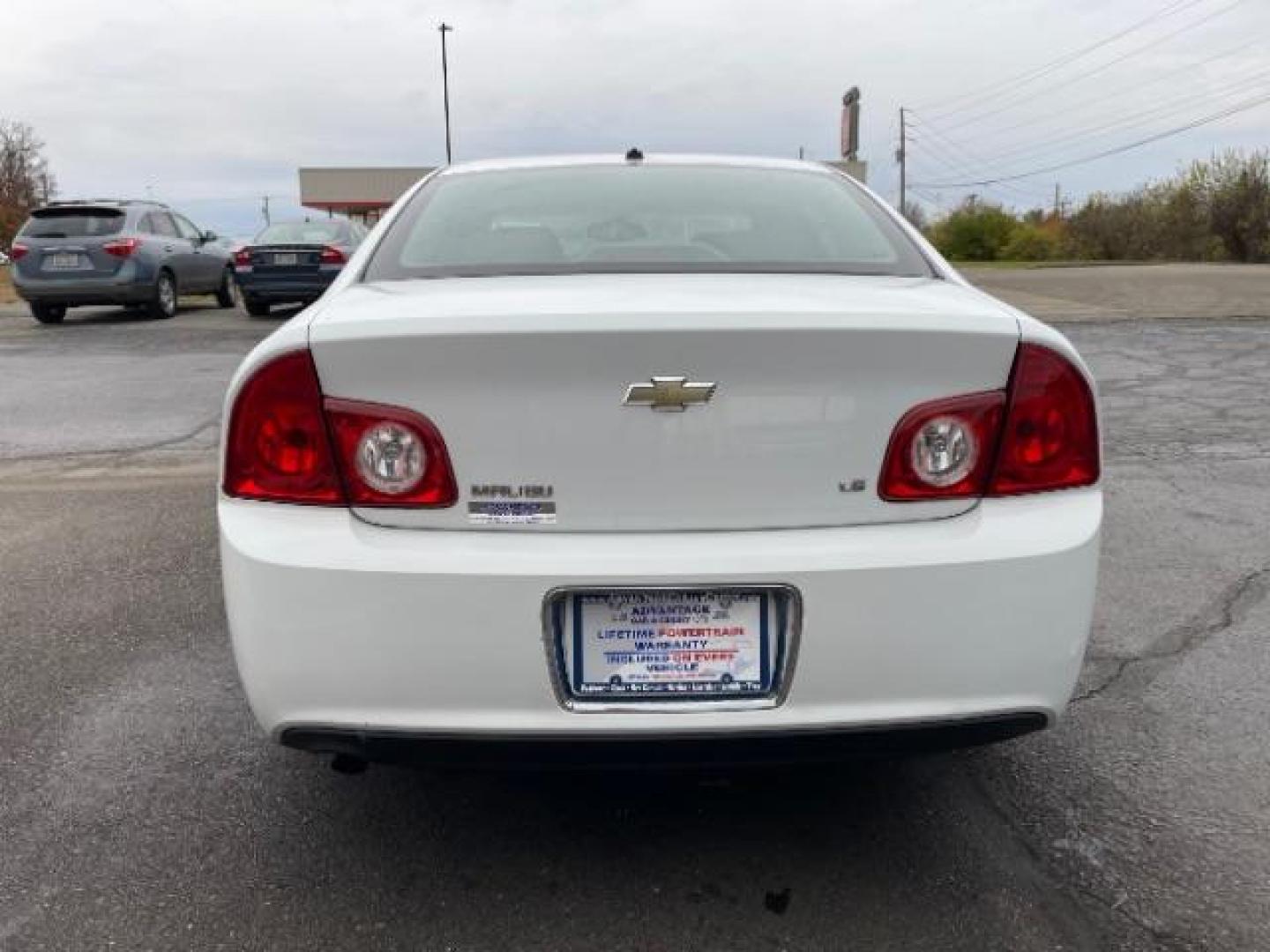 2009 Summit White Chevrolet Malibu LS (1G1ZG57B69F) with an 2.4L L4 DOHC 16V engine, 4-Speed Automatic transmission, located at 1230 East Main St, Xenia, OH, 45385, (937) 908-9800, 39.687321, -83.910294 - Photo#5