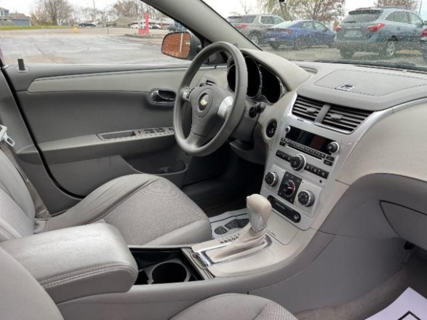 2009 Summit White Chevrolet Malibu LS (1G1ZG57B69F) with an 2.4L L4 DOHC 16V engine, 4-Speed Automatic transmission, located at 1230 East Main St, Xenia, OH, 45385, (937) 908-9800, 39.687321, -83.910294 - Photo#7