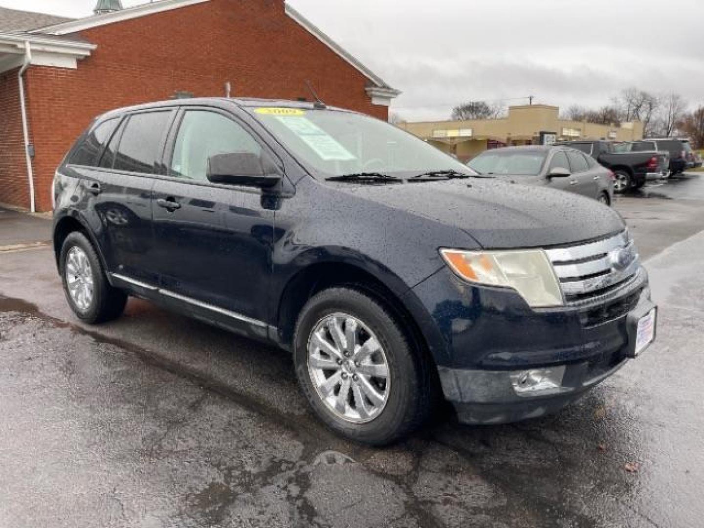 2009 Black Ford Edge SEL FWD (2FMDK38C29B) with an 3.5L V6 DOHC 24V engine, 6-Speed Automatic transmission, located at 1230 East Main St, Xenia, OH, 45385, (937) 908-9800, 39.687321, -83.910294 - Photo#0