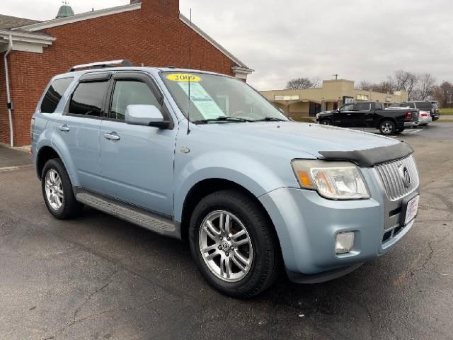 2009 Light Ice Blue Mercury Mariner Premier V6 2WD (4M2CU87G09K) , 6-Speed Automatic transmission, located at 401 Woodman Dr, Riverside, OH, 45431, (937) 908-9800, 39.763779, -84.122063 - Photo#0