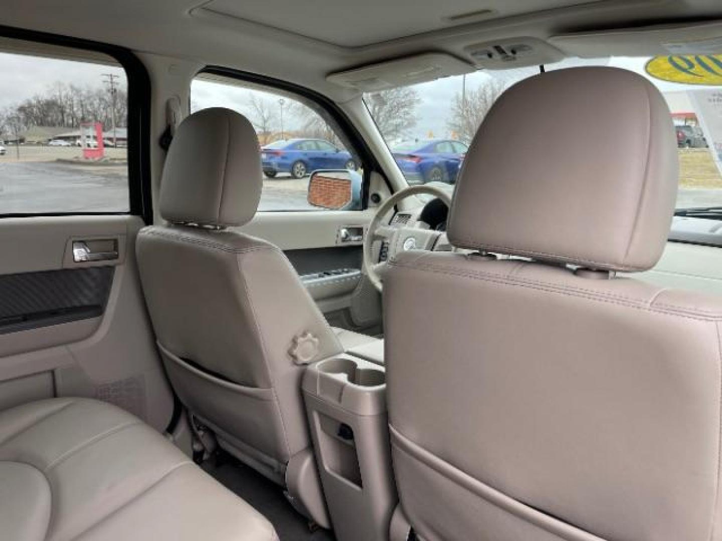 2009 Light Ice Blue Mercury Mariner Premier V6 2WD (4M2CU87G09K) , 6-Speed Automatic transmission, located at 401 Woodman Dr, Riverside, OH, 45431, (937) 908-9800, 39.763779, -84.122063 - Photo#9