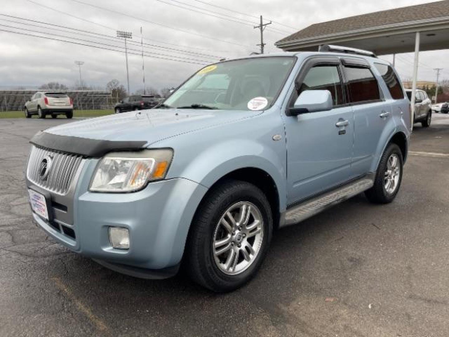 2009 Light Ice Blue Mercury Mariner Premier V6 2WD (4M2CU87G09K) , 6-Speed Automatic transmission, located at 401 Woodman Dr, Riverside, OH, 45431, (937) 908-9800, 39.763779, -84.122063 - Photo#1