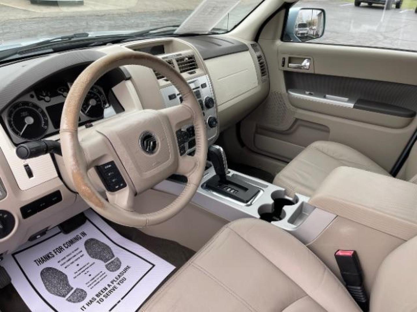 2009 Light Ice Blue Mercury Mariner Premier V6 2WD (4M2CU87G09K) , 6-Speed Automatic transmission, located at 401 Woodman Dr, Riverside, OH, 45431, (937) 908-9800, 39.763779, -84.122063 - Photo#6