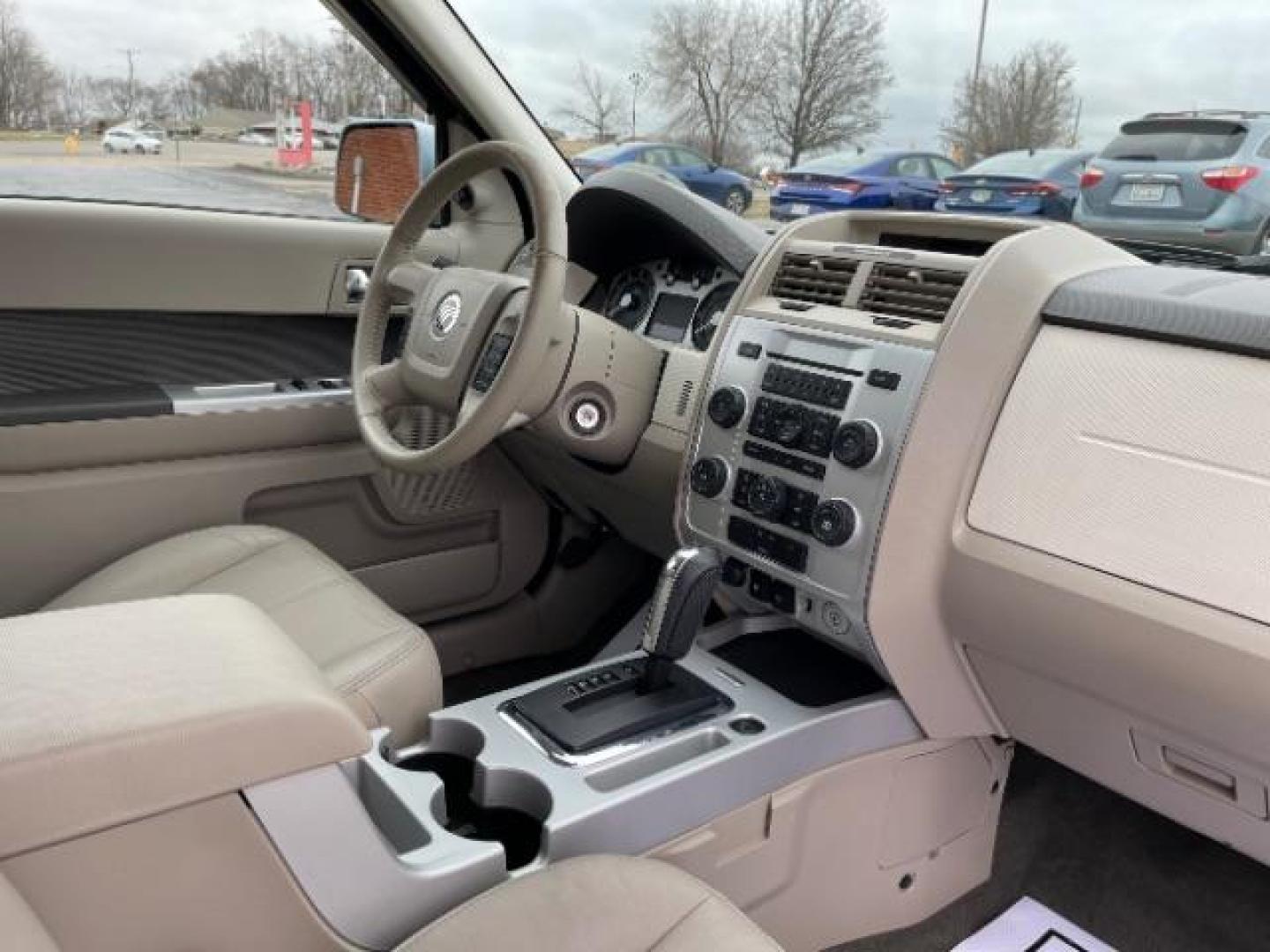 2009 Light Ice Blue Mercury Mariner Premier V6 2WD (4M2CU87G09K) , 6-Speed Automatic transmission, located at 401 Woodman Dr, Riverside, OH, 45431, (937) 908-9800, 39.763779, -84.122063 - Photo#8