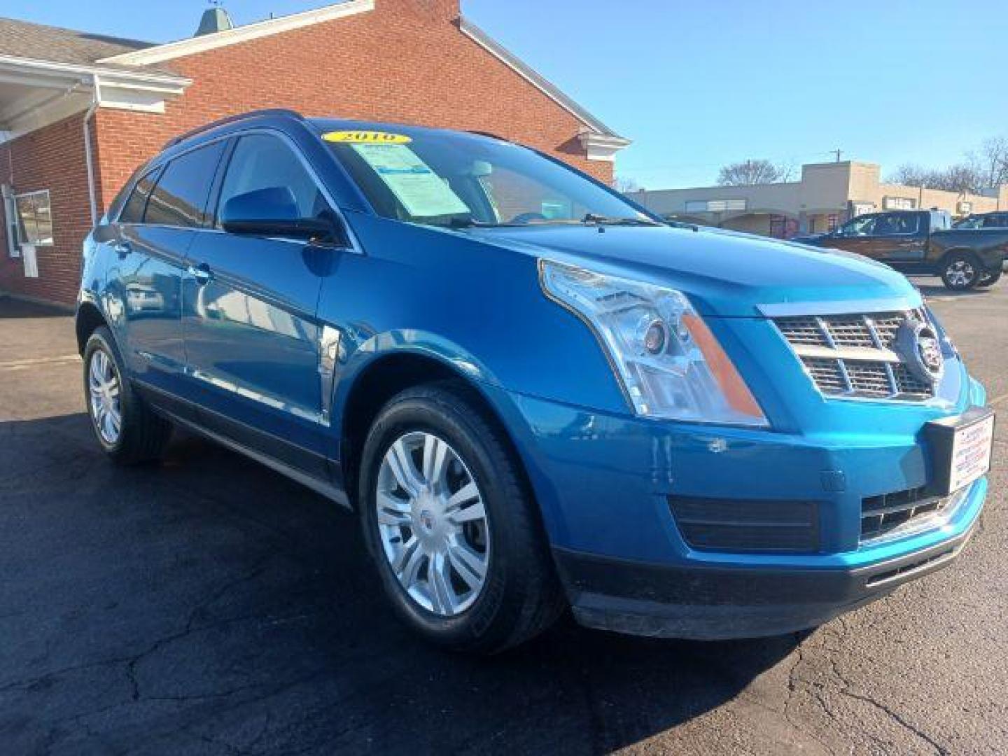 2010 Caribbean Blue Cadillac SRX Base (3GYFNGEY1AS) with an 3.0L V6 DOHC 24V engine, 6-Speed Automatic transmission, located at 1230 East Main St, Xenia, OH, 45385, (937) 908-9800, 39.687321, -83.910294 - Photo#0