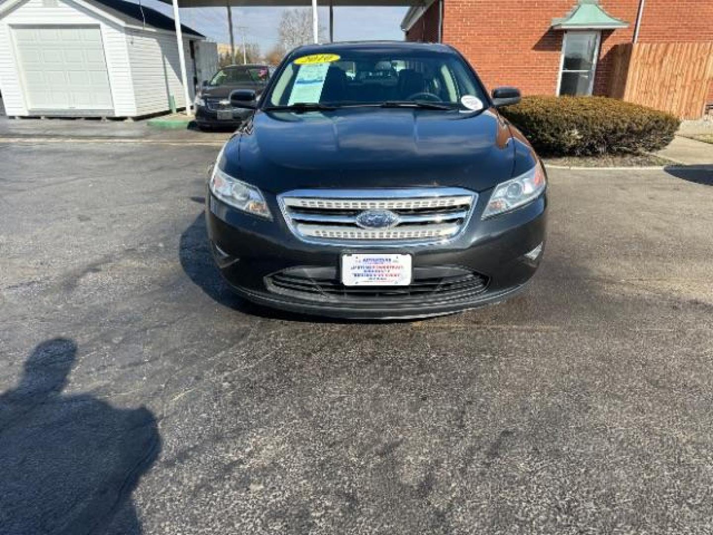 2010 Tuxedo Black Metallic Ford Taurus SEL FWD (1FAHP2EW5AG) with an 3.5L V6 DOHC 24V engine, 6-Speed Automatic transmission, located at 1184 Kauffman Ave, Fairborn, OH, 45324, (937) 908-9800, 39.807365, -84.029114 - Photo#1