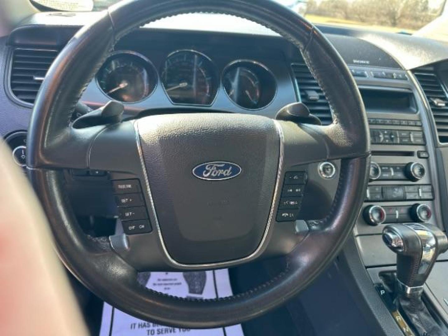 2010 Tuxedo Black Metallic Ford Taurus SEL FWD (1FAHP2EW5AG) with an 3.5L V6 DOHC 24V engine, 6-Speed Automatic transmission, located at 1184 Kauffman Ave, Fairborn, OH, 45324, (937) 908-9800, 39.807365, -84.029114 - Photo#7