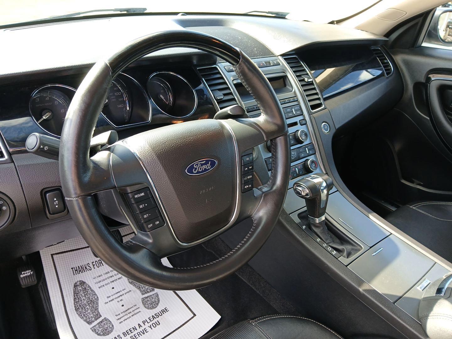 2010 Tuxedo Black Metallic Ford Taurus Limited FWD (1FAHP2FW5AG) with an 3.5L V6 DOHC 24V engine, 6-Speed Automatic transmission, located at 1184 Kauffman Ave, Fairborn, OH, 45324, (937) 908-9800, 39.807365, -84.029114 - Photo#8