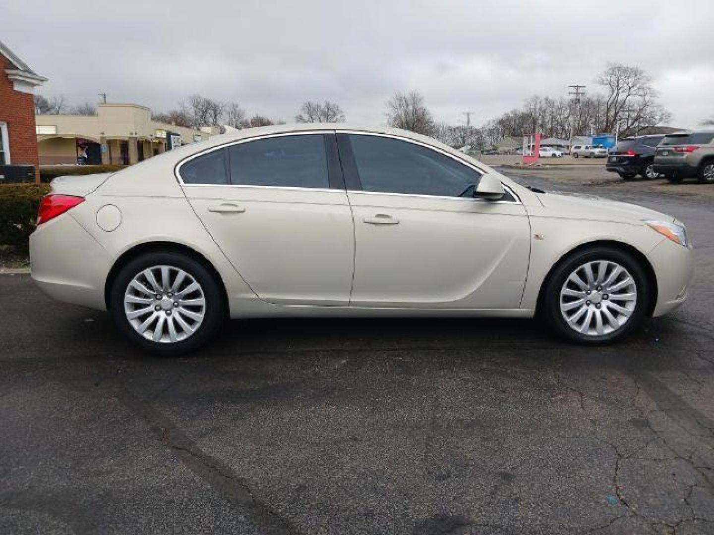 2011 Stone Metallic Buick Regal CXL - 1XL (2G4GN5EC9B9) with an 2.4L L4 DOHC 16V engine, 6-Speed Automatic transmission, located at 880 E. National Road, Vandalia, OH, 45377, (937) 908-9800, 39.892189, -84.181015 - Photo#4