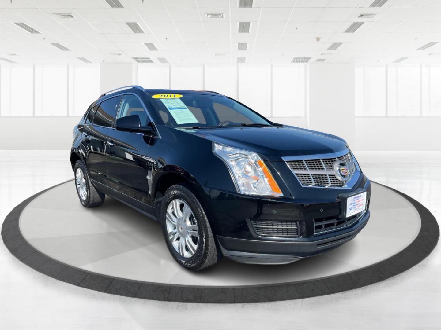 2011 Black Raven Cadillac SRX Luxury Collection (3GYFNAEY6BS) with an 3.0L V6 DOHC 24V engine, 6-Speed Automatic transmission, located at 1099 N County Rd 25A, OH, 45373, (937) 908-9800, 40.057079, -84.212883 - Photo#0