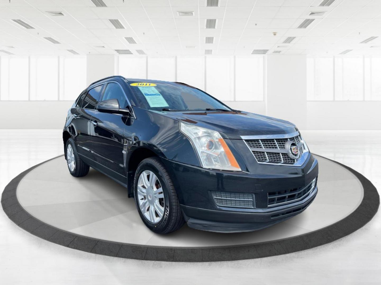 2011 Black Raven Cadillac SRX (3GYFNGEY5BS) with an 3.0L V6 DOHC 24V engine, 6-Speed Automatic transmission, located at 401 Woodman Dr, Riverside, OH, 45431, (937) 908-9800, 39.763779, -84.122063 - Photo#0