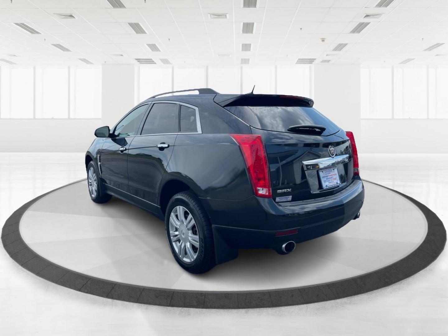 2011 Black Raven Cadillac SRX (3GYFNGEY5BS) with an 3.0L V6 DOHC 24V engine, 6-Speed Automatic transmission, located at 401 Woodman Dr, Riverside, OH, 45431, (937) 908-9800, 39.763779, -84.122063 - Photo#4