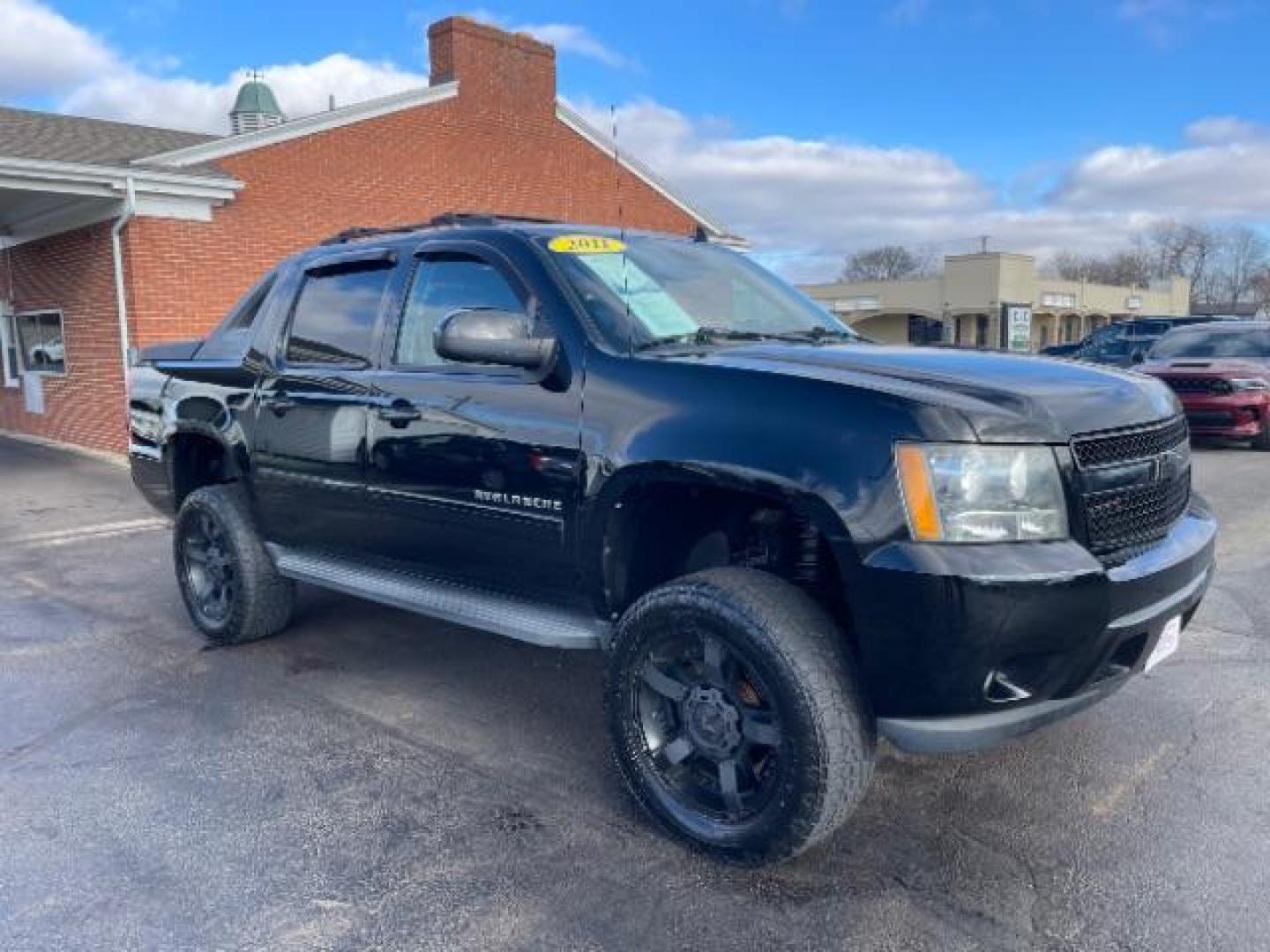 2011 Black Chevrolet Avalanche LTZ 4WD (3GNTKGE30BG) with an 5.3L V8 OHV 16V FFV engine, 4-Speed Automatic transmission, located at 401 Woodman Dr, Riverside, OH, 45431, (937) 908-9800, 39.763779, -84.122063 - Photo#0