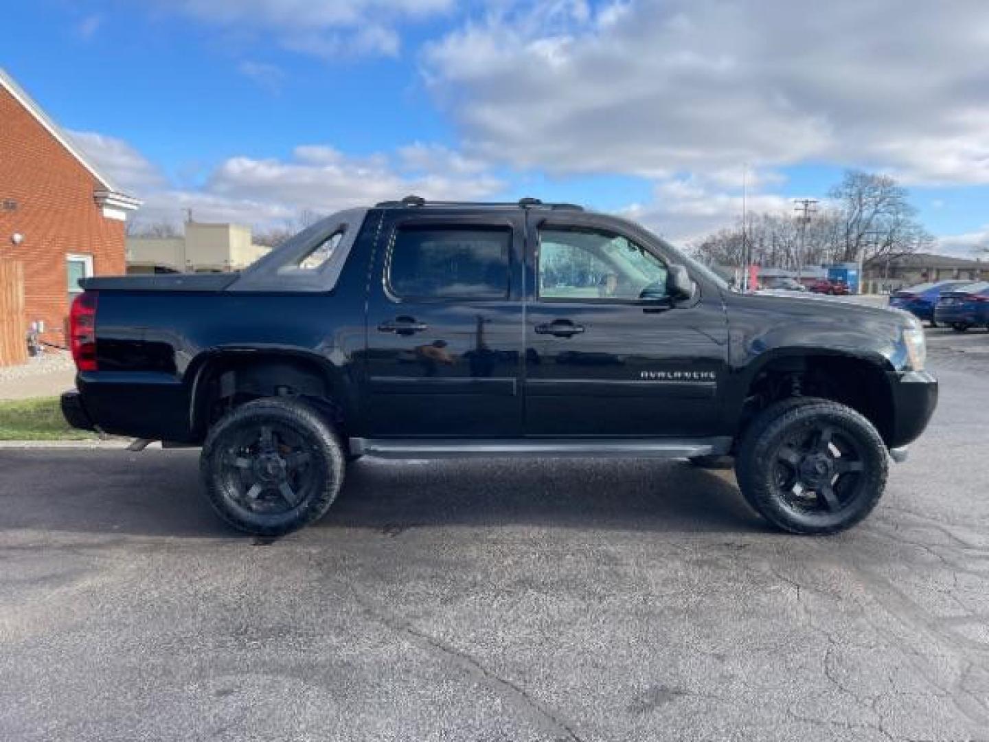 2011 Black Chevrolet Avalanche LTZ 4WD (3GNTKGE30BG) with an 5.3L V8 OHV 16V FFV engine, 4-Speed Automatic transmission, located at 401 Woodman Dr, Riverside, OH, 45431, (937) 908-9800, 39.763779, -84.122063 - Photo#2