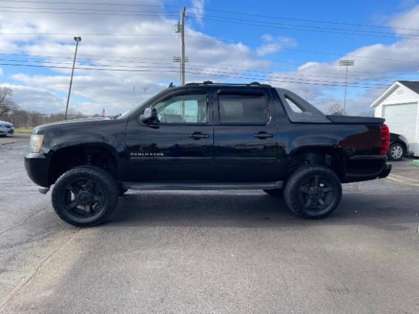 2011 Black Chevrolet Avalanche LTZ 4WD (3GNTKGE30BG) with an 5.3L V8 OHV 16V FFV engine, 4-Speed Automatic transmission, located at 401 Woodman Dr, Riverside, OH, 45431, (937) 908-9800, 39.763779, -84.122063 - Photo#3