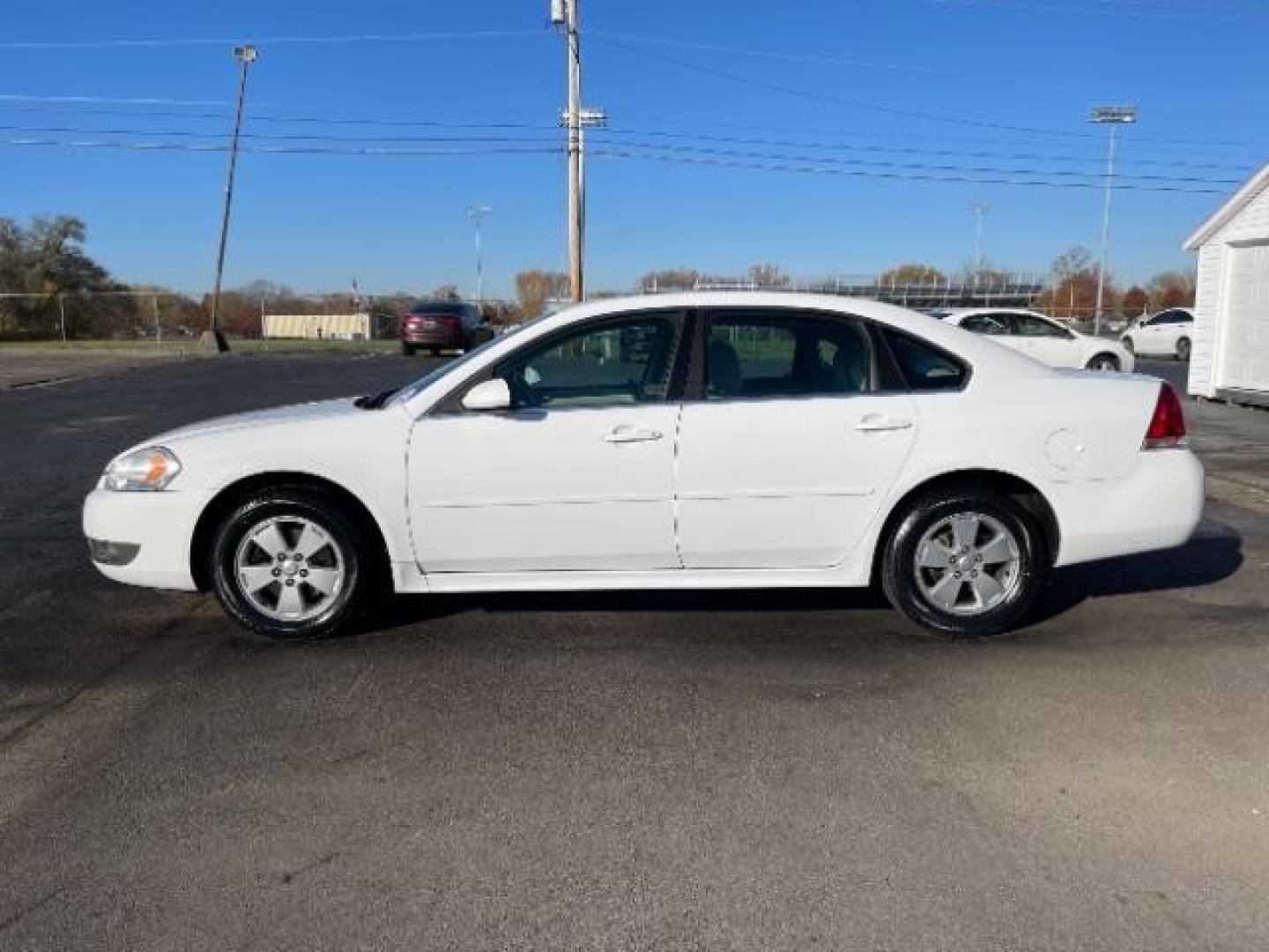 2011 Summit White Chevrolet Impala LT (2G1WG5EK0B1) with an 3.5L V6 OHV 16V FFV engine, 4-Speed Automatic transmission, located at 4508 South Dixie Dr, Moraine, OH, 45439, (937) 908-9800, 39.690136, -84.216438 - Photo#3