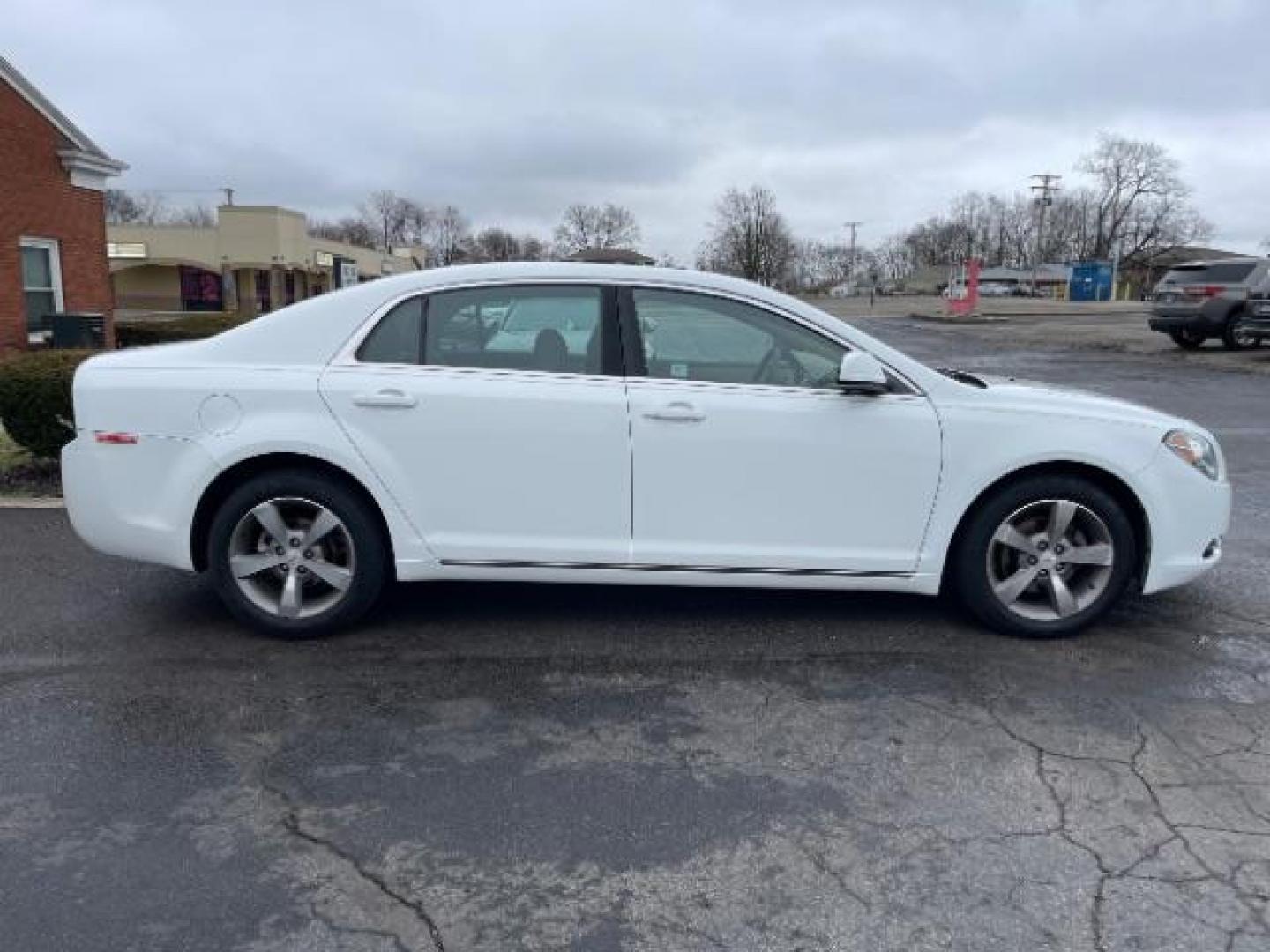 2011 Summit White Chevrolet Malibu 1LT (1G1ZC5E14BF) with an 2.4L L4 DOHC 16V engine, 6-Speed Automatic transmission, located at 4508 South Dixie Dr, Moraine, OH, 45439, (937) 908-9800, 39.690136, -84.216438 - Photo#3