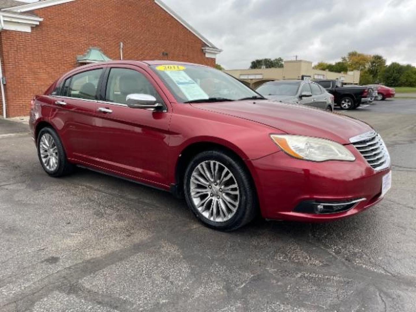 2011 Deep Cherry Red Crystal Pearl Chrysler 200 Limited (1C3BC2FG4BN) with an 3.6L V6 DOHC 24V FFV engine, 6-Speed Automatic transmission, located at 1230 East Main St, Xenia, OH, 45385, (937) 908-9800, 39.687321, -83.910294 - Photo#0