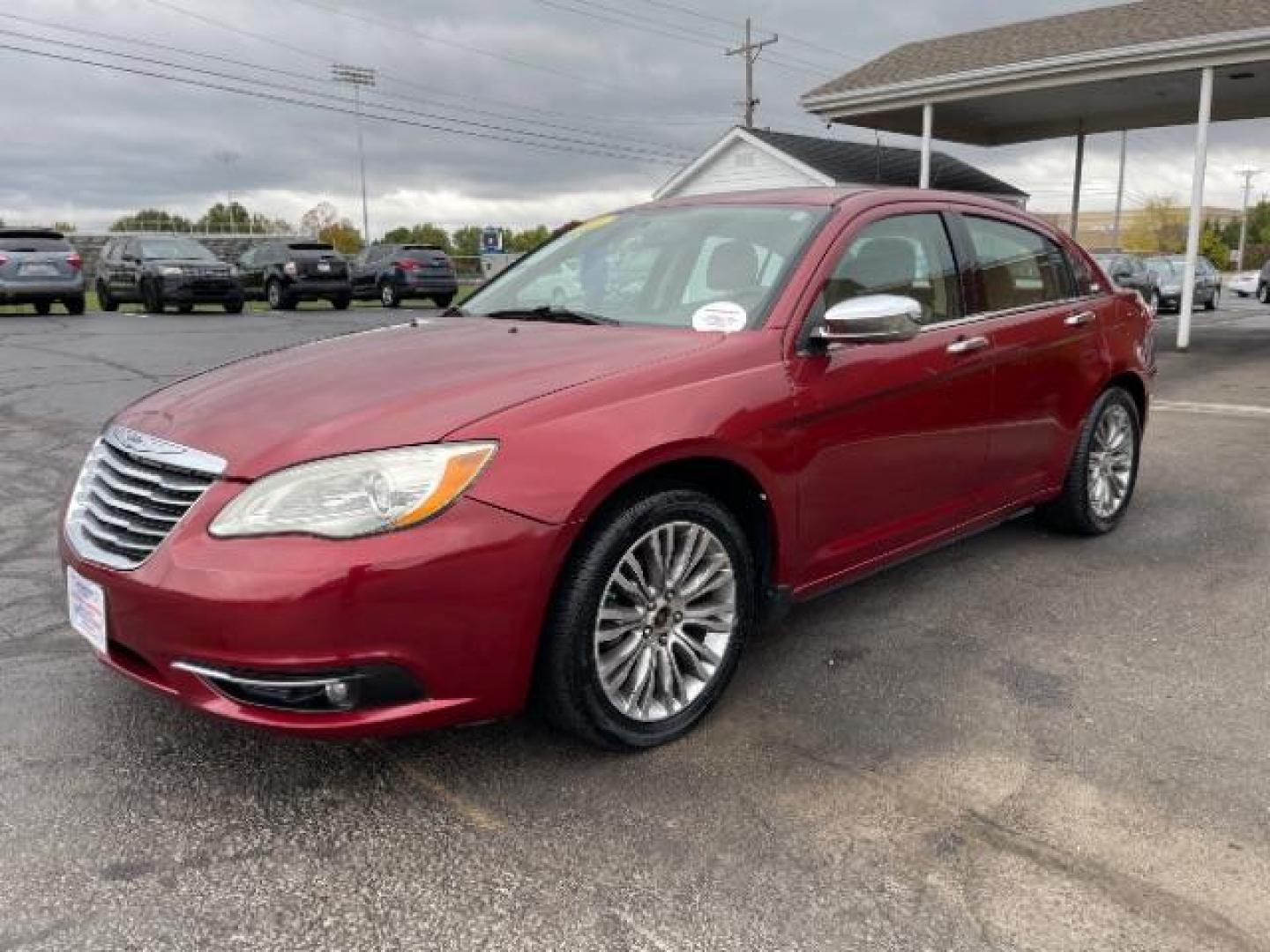 2011 Deep Cherry Red Crystal Pearl Chrysler 200 Limited (1C3BC2FG4BN) with an 3.6L V6 DOHC 24V FFV engine, 6-Speed Automatic transmission, located at 1230 East Main St, Xenia, OH, 45385, (937) 908-9800, 39.687321, -83.910294 - Photo#2