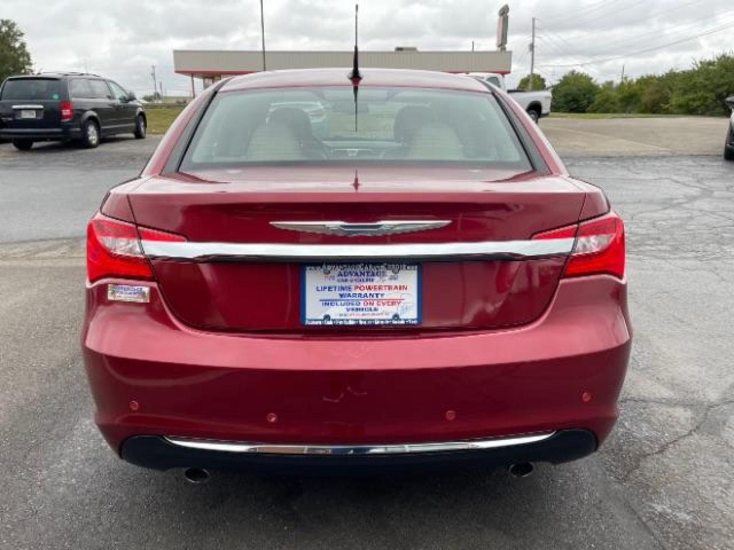 2011 Deep Cherry Red Crystal Pearl Chrysler 200 Limited (1C3BC2FG4BN) with an 3.6L V6 DOHC 24V FFV engine, 6-Speed Automatic transmission, located at 1230 East Main St, Xenia, OH, 45385, (937) 908-9800, 39.687321, -83.910294 - Photo#4