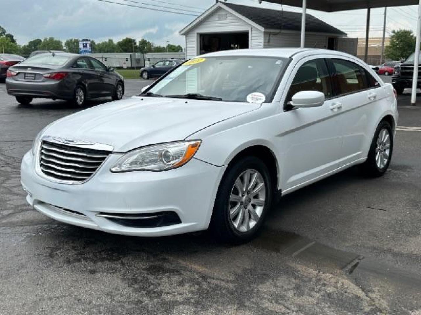 2011 White Gold Chrysler 200 Touring (1C3BC1FB3BN) with an 2.4L L4 DOHC 16V engine, 6-Speed Automatic transmission, located at 4508 South Dixie Dr, Moraine, OH, 45439, (937) 908-9800, 39.690136, -84.216438 - Photo#2