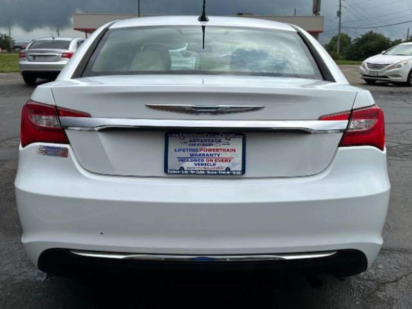 2011 White Gold Chrysler 200 Touring (1C3BC1FB3BN) with an 2.4L L4 DOHC 16V engine, 6-Speed Automatic transmission, located at 4508 South Dixie Dr, Moraine, OH, 45439, (937) 908-9800, 39.690136, -84.216438 - Photo#4