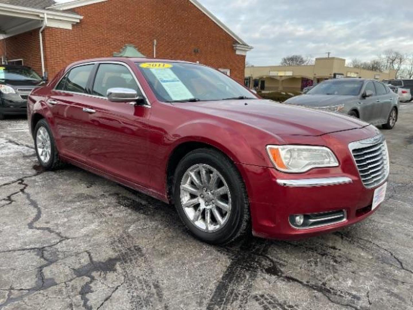 2011 Deep Cherry Red Crystal Pearl Chrysler 300 Limited RWD (2C3CA5CG5BH) with an 3.6L V6 SOHC 24V engine, 5-Speed Automatic transmission, located at 1230 East Main St, Xenia, OH, 45385, (937) 908-9800, 39.687321, -83.910294 - Photo#0