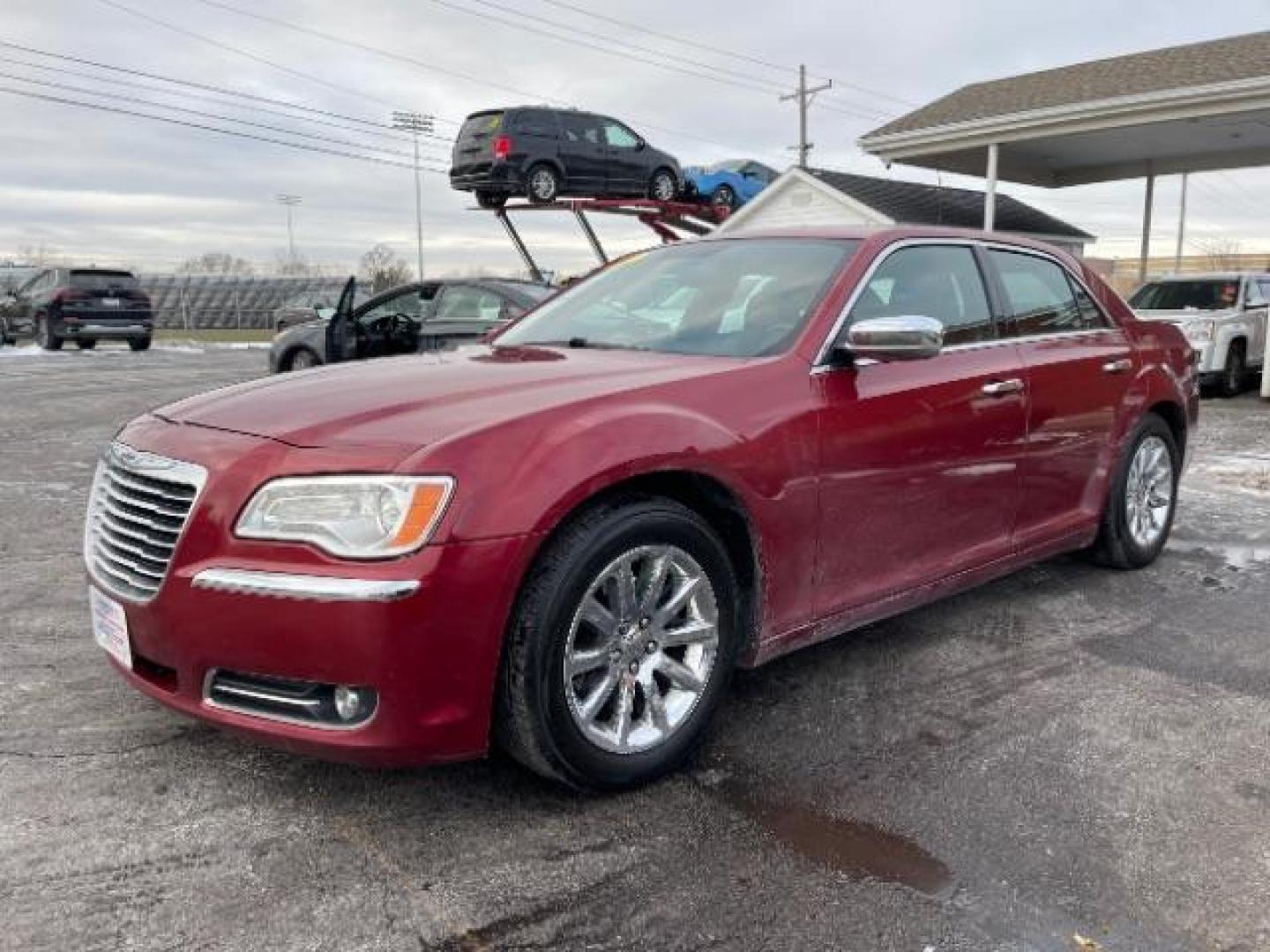 2011 Deep Cherry Red Crystal Pearl Chrysler 300 Limited RWD (2C3CA5CG5BH) with an 3.6L V6 SOHC 24V engine, 5-Speed Automatic transmission, located at 1230 East Main St, Xenia, OH, 45385, (937) 908-9800, 39.687321, -83.910294 - Photo#1