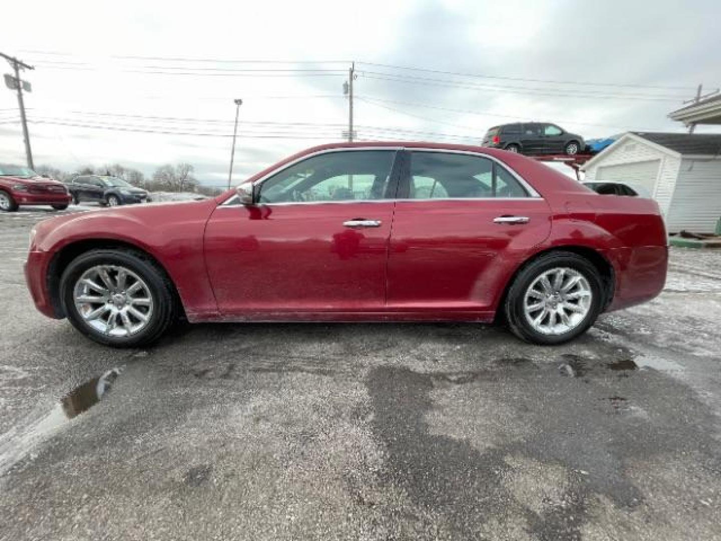 2011 Deep Cherry Red Crystal Pearl Chrysler 300 Limited RWD (2C3CA5CG5BH) with an 3.6L V6 SOHC 24V engine, 5-Speed Automatic transmission, located at 1230 East Main St, Xenia, OH, 45385, (937) 908-9800, 39.687321, -83.910294 - Photo#2