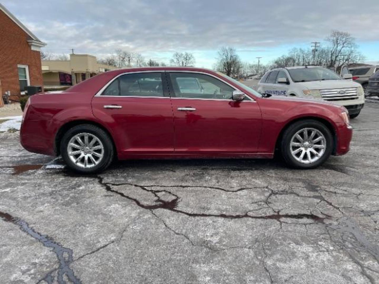 2011 Deep Cherry Red Crystal Pearl Chrysler 300 Limited RWD (2C3CA5CG5BH) with an 3.6L V6 SOHC 24V engine, 5-Speed Automatic transmission, located at 1230 East Main St, Xenia, OH, 45385, (937) 908-9800, 39.687321, -83.910294 - Photo#3