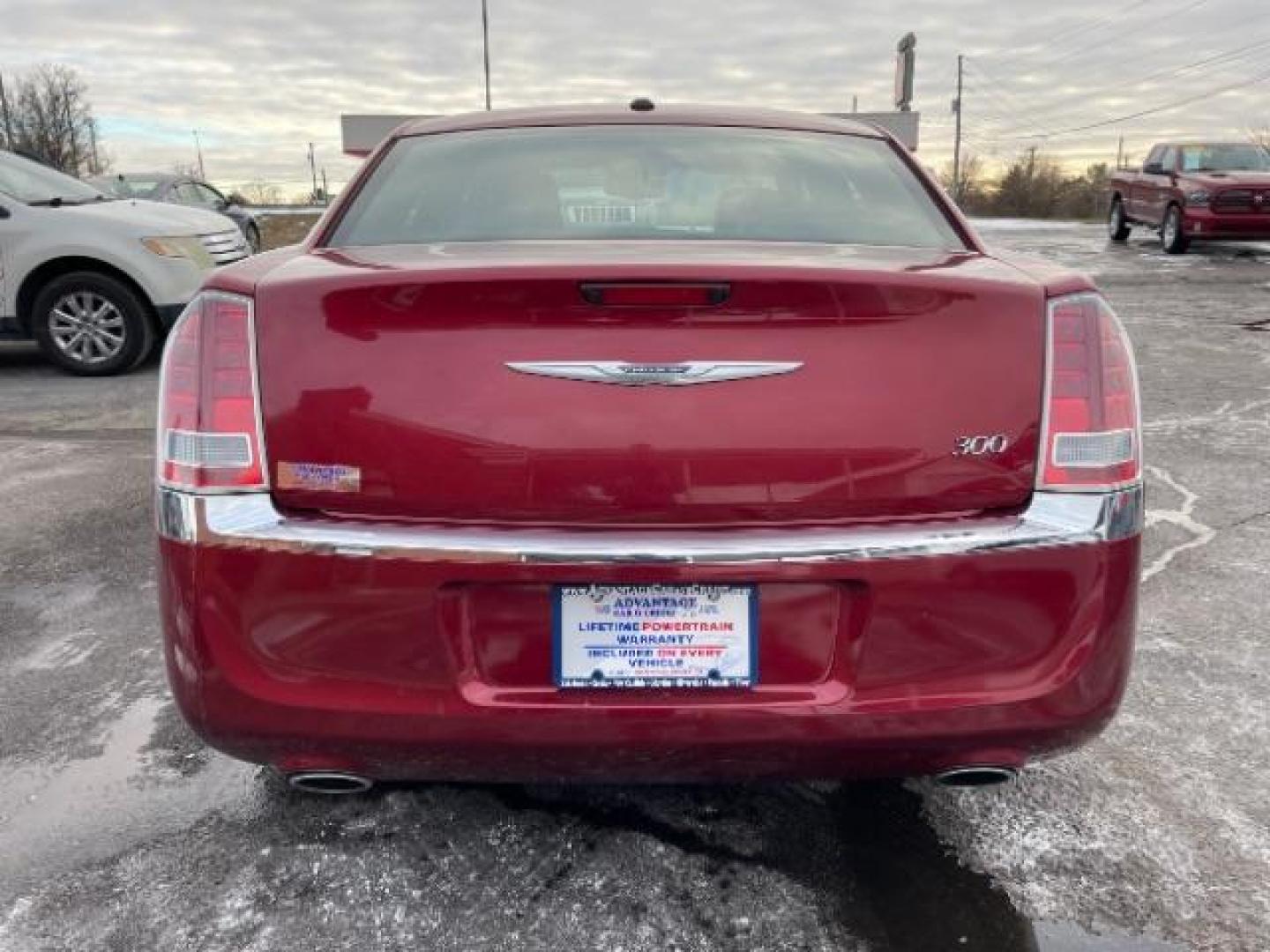 2011 Deep Cherry Red Crystal Pearl Chrysler 300 Limited RWD (2C3CA5CG5BH) with an 3.6L V6 SOHC 24V engine, 5-Speed Automatic transmission, located at 1230 East Main St, Xenia, OH, 45385, (937) 908-9800, 39.687321, -83.910294 - Photo#4