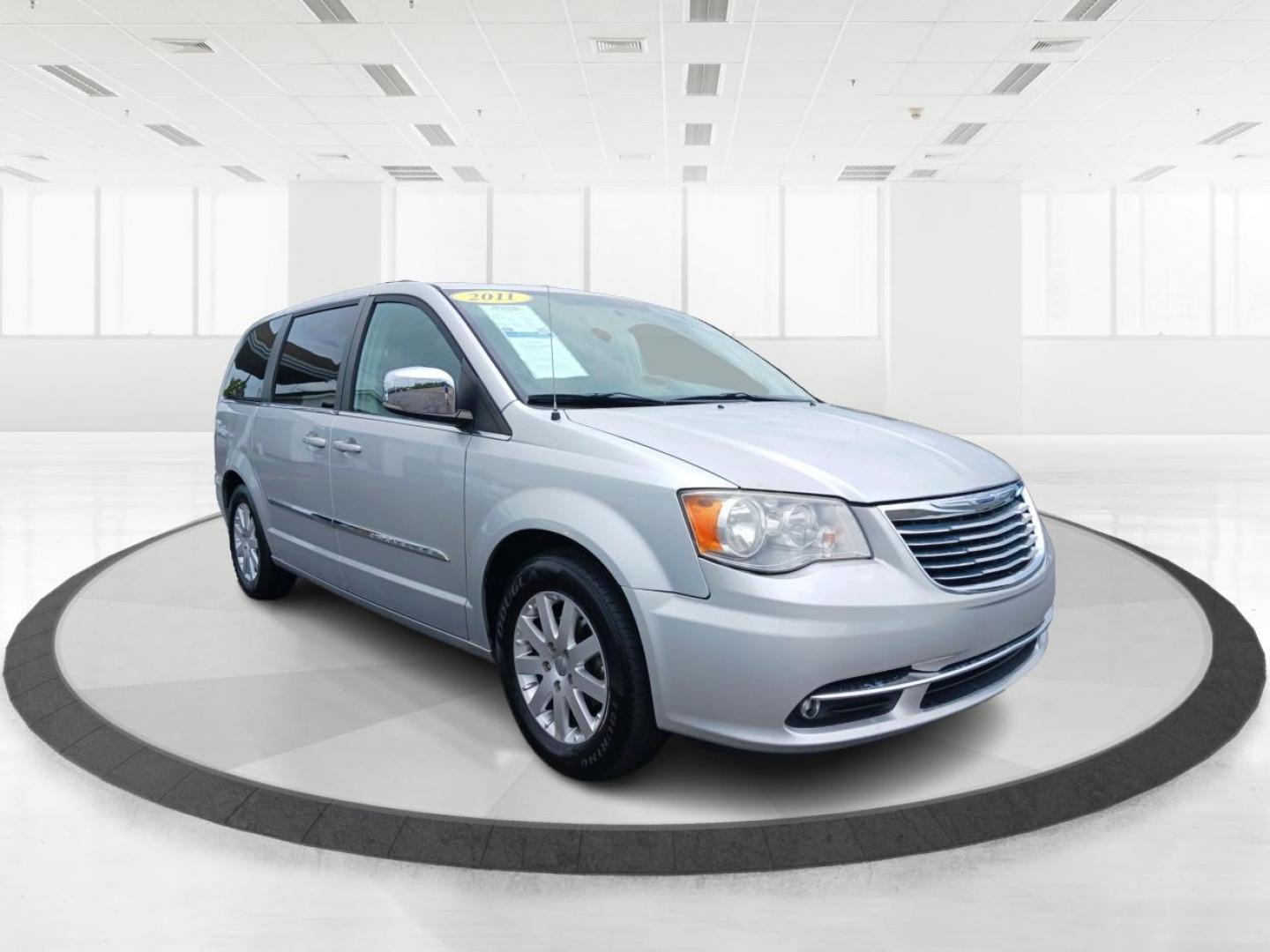 2011 Bright Silver Metallic Chrysler Town and Country Touring-L (2A4RR8DG1BR) with an 3.6L V6 DOHC 24V engine, 6-Speed Automatic transmission, located at 1184 Kauffman Ave, Fairborn, OH, 45324, (937) 908-9800, 39.807365, -84.029114 - Photo#0