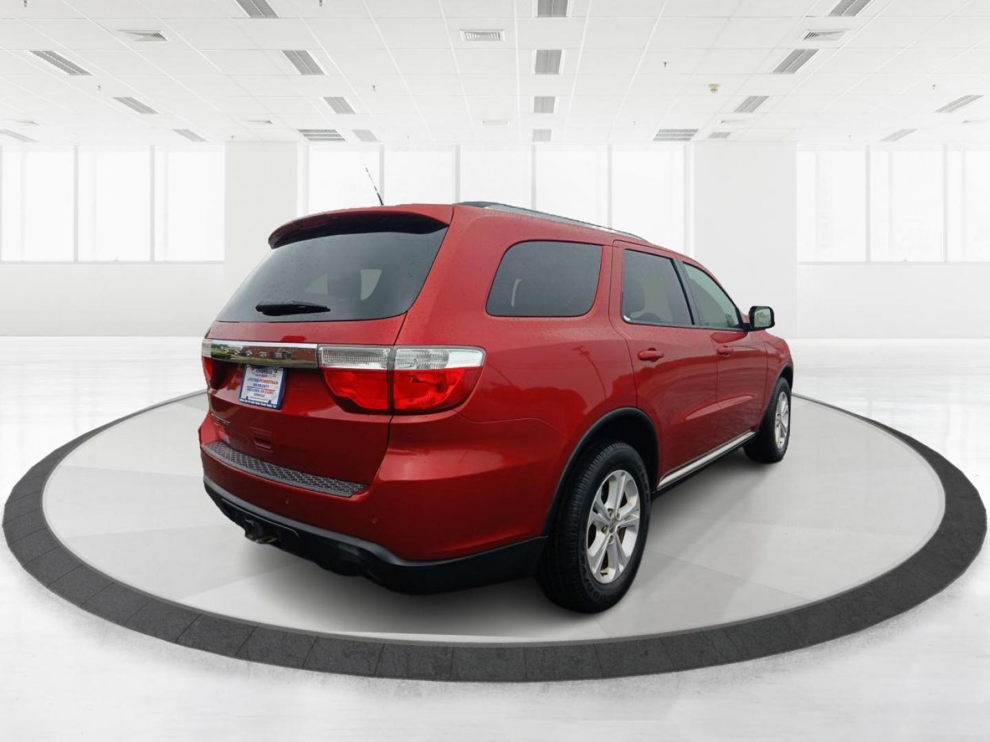 2011 Inferno Red Crystal Pearl Dodge Durango (1D4RE2GG1BC) with an 3.6L V6 DOHC 24V engine, 5-Speed Automatic transmission, located at 1230 East Main St, Xenia, OH, 45385, (937) 908-9800, 39.687321, -83.910294 - Photo#2