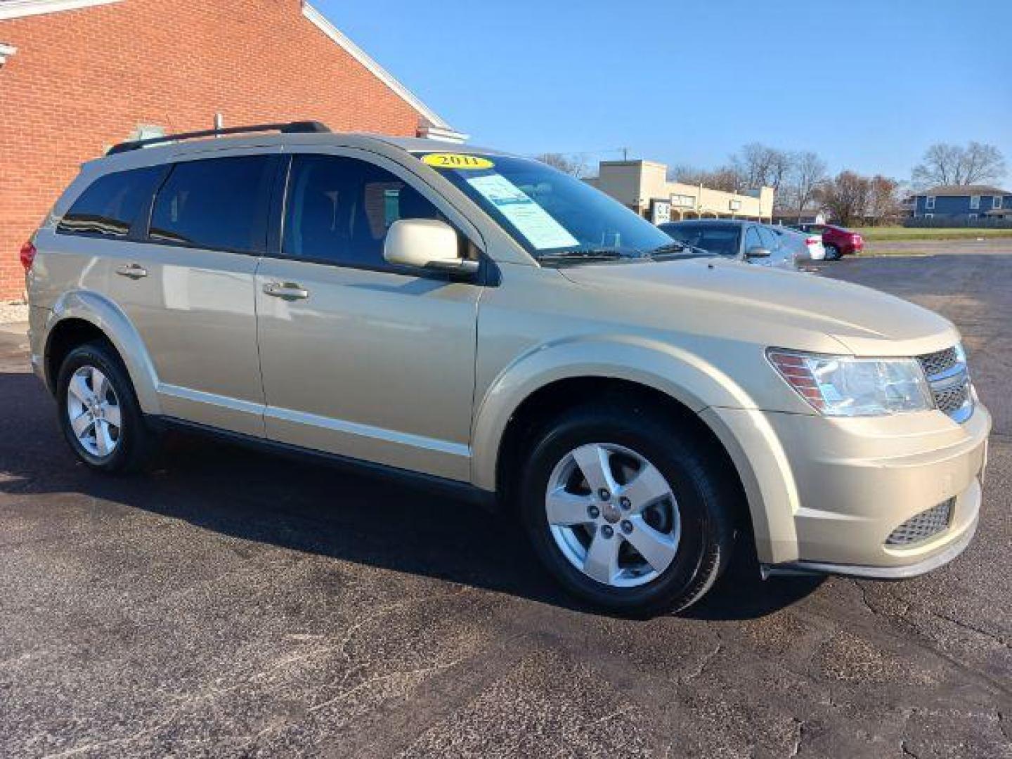 2011 White Gold Dodge Journey Mainstreet (3D4PG1FG9BT) with an 3.6L V6 DOHC 24V engine, 6-Speed Automatic transmission, located at 880 E. National Road, Vandalia, OH, 45377, (937) 908-9800, 39.892189, -84.181015 - Photo#0