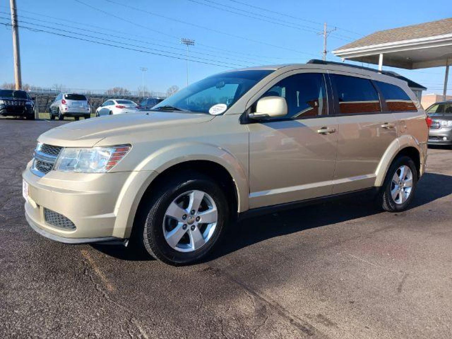 2011 White Gold Dodge Journey Mainstreet (3D4PG1FG9BT) with an 3.6L V6 DOHC 24V engine, 6-Speed Automatic transmission, located at 880 E. National Road, Vandalia, OH, 45377, (937) 908-9800, 39.892189, -84.181015 - Photo#2