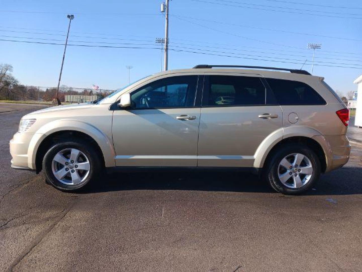 2011 White Gold Dodge Journey Mainstreet (3D4PG1FG9BT) with an 3.6L V6 DOHC 24V engine, 6-Speed Automatic transmission, located at 880 E. National Road, Vandalia, OH, 45377, (937) 908-9800, 39.892189, -84.181015 - Photo#3