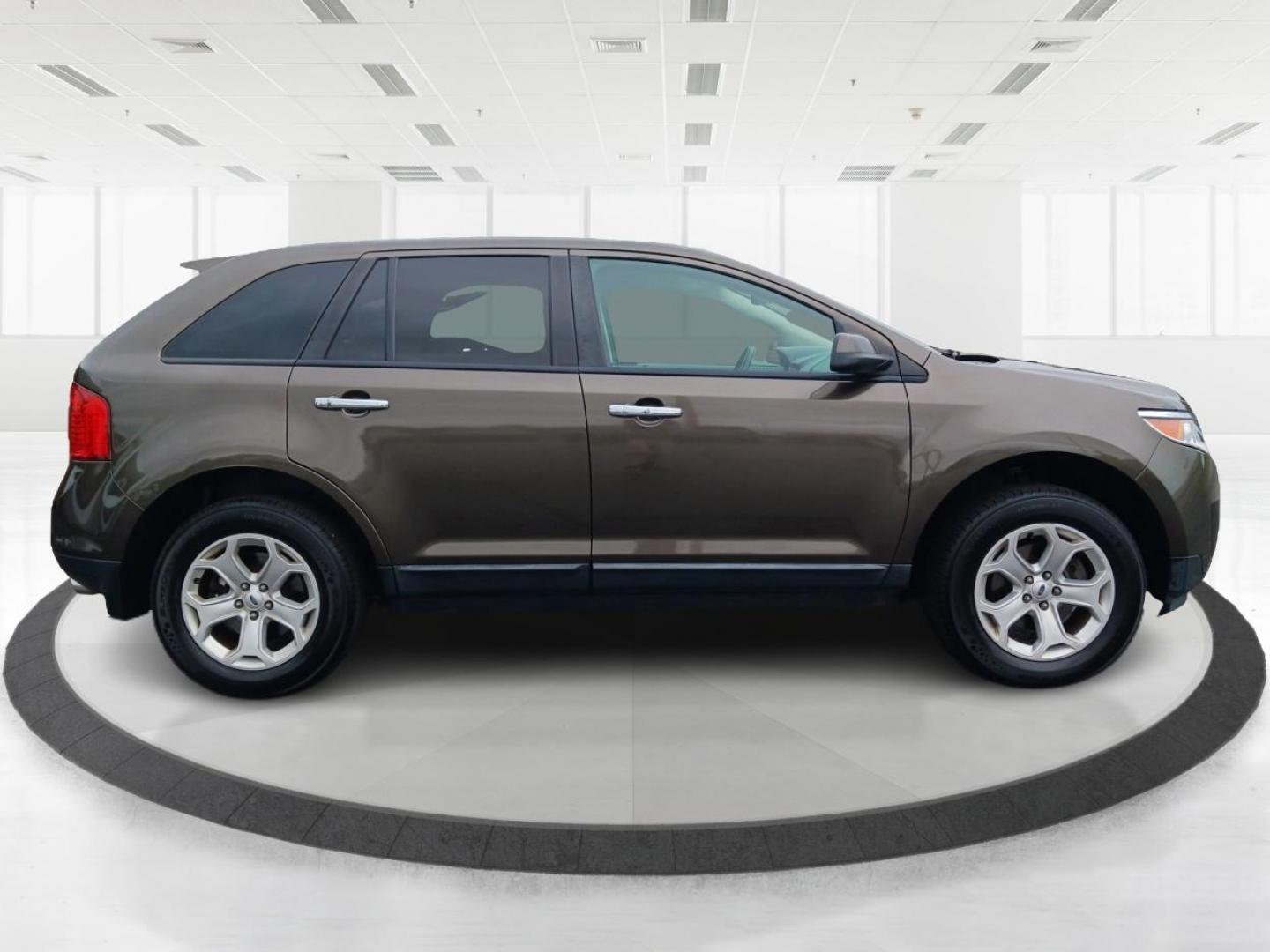 2011 Earth Metallic Ford Edge SEL AWD (2FMDK4JC9BB) with an 3.5L V6 DOHC 24V engine, 6-Speed Automatic transmission, located at 1951 S Dayton Lakeview Rd., New Carlisle, OH, 45344, (937) 908-9800, 39.890999, -84.050255 - Photo#1