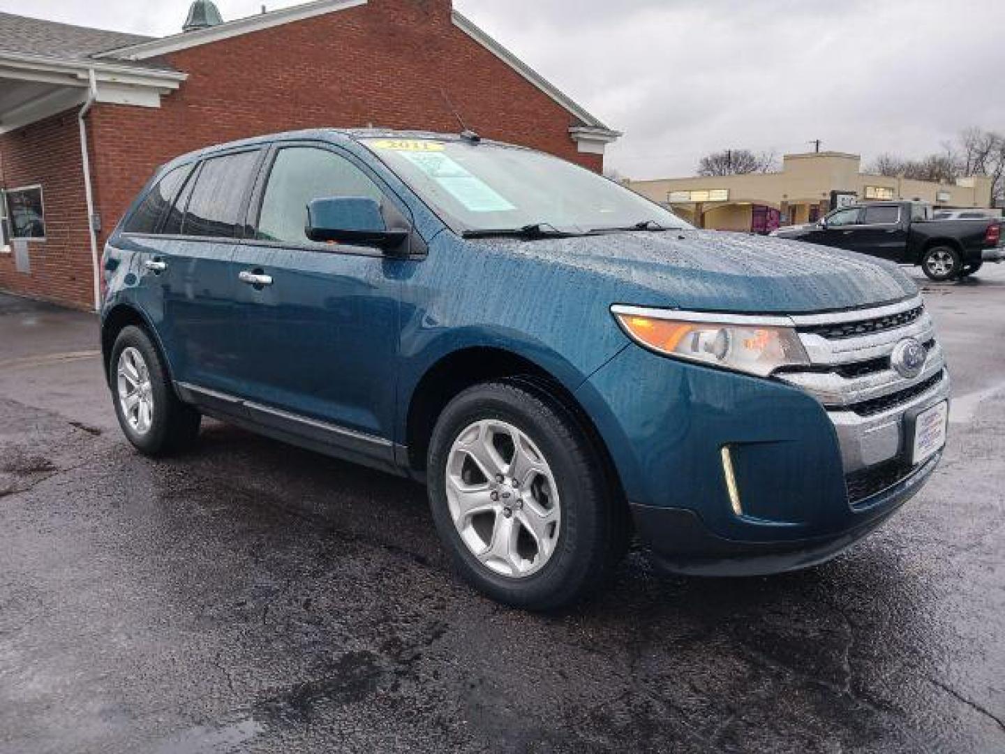 2011 Earth Metallic Ford Edge SEL AWD (2FMDK4JC7BB) with an 3.5L V6 DOHC 24V engine, 6-Speed Automatic transmission, located at 1184 Kauffman Ave, Fairborn, OH, 45324, (937) 908-9800, 39.807365, -84.029114 - Photo#0