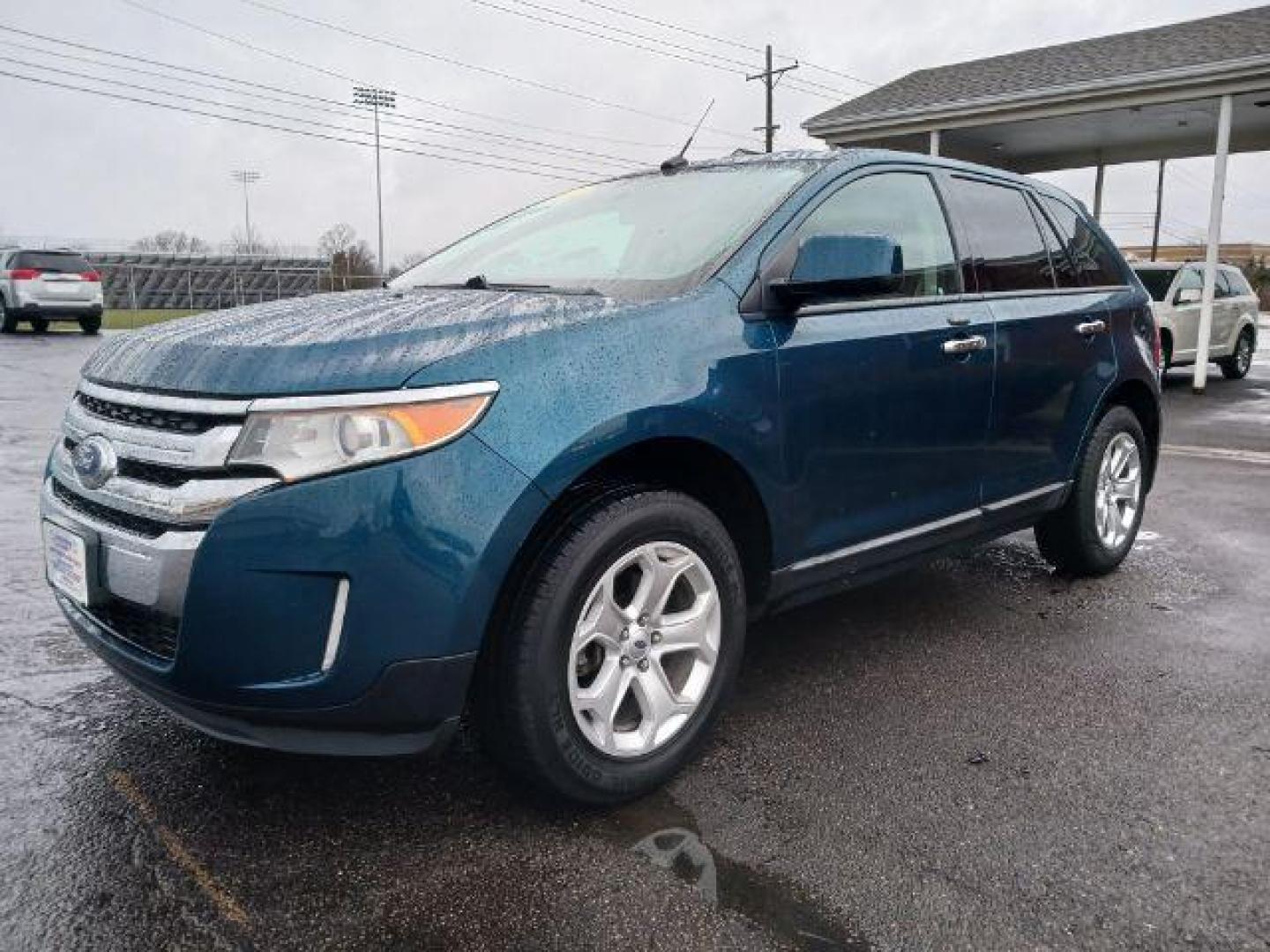 2011 Earth Metallic Ford Edge SEL AWD (2FMDK4JC7BB) with an 3.5L V6 DOHC 24V engine, 6-Speed Automatic transmission, located at 1184 Kauffman Ave, Fairborn, OH, 45324, (937) 908-9800, 39.807365, -84.029114 - Photo#2