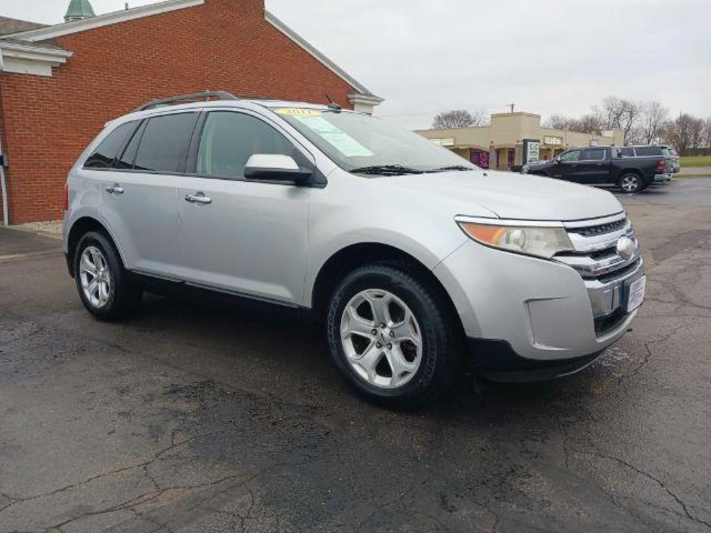 2011 Ingot Silver Metallic Ford Edge SEL FWD (2FMDK3JC8BB) with an 3.5L V6 DOHC 24V engine, 6-Speed Automatic transmission, located at 1099 N County Rd 25A, OH, 45373, (937) 908-9800, 40.057079, -84.212883 - Photo#0