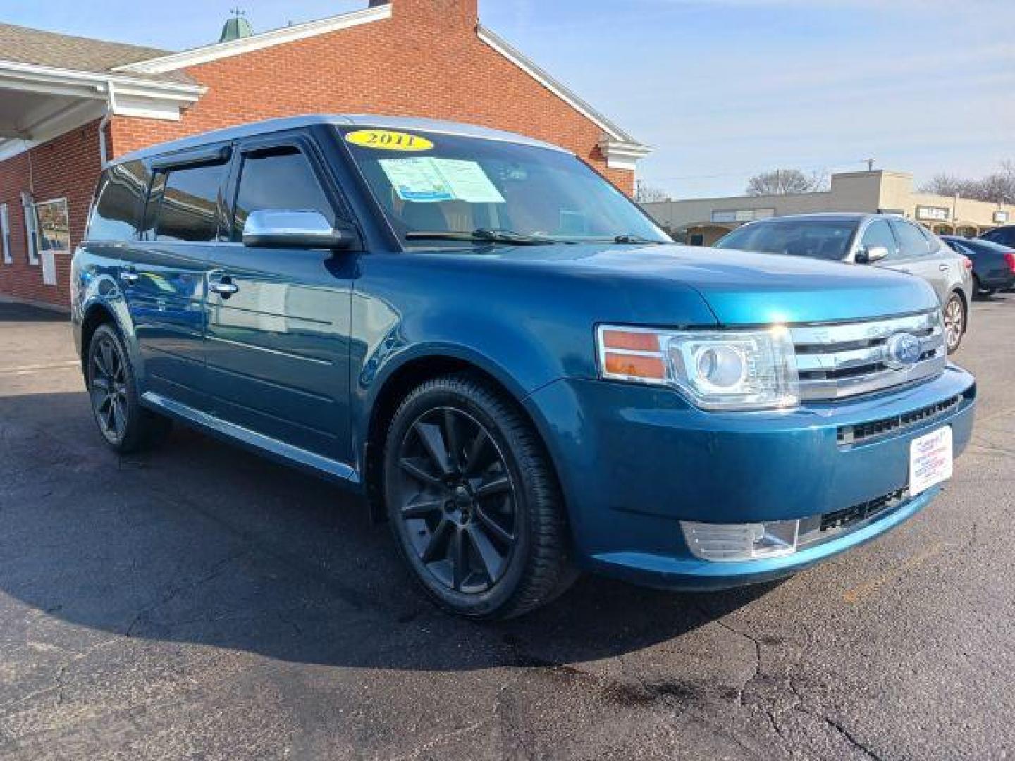 2011 Earth Metallic Ford Flex Limited AWD (2FMHK6DC9BB) with an 3.5L V6 DOHC 24V engine, 6-Speed Automatic Overdrive transmission, located at 1184 Kauffman Ave, Fairborn, OH, 45324, (937) 908-9800, 39.807365, -84.029114 - Photo#0