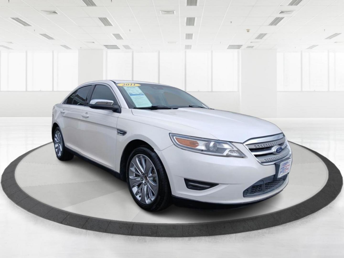 2011 White Platinum Metallic Ford Taurus Limited FWD (1FAHP2FW9BG) with an 3.5L V6 DOHC 24V engine, 6-Speed Automatic transmission, located at 1099 N County Rd 25A, OH, 45373, (937) 908-9800, 40.057079, -84.212883 - Photo#0