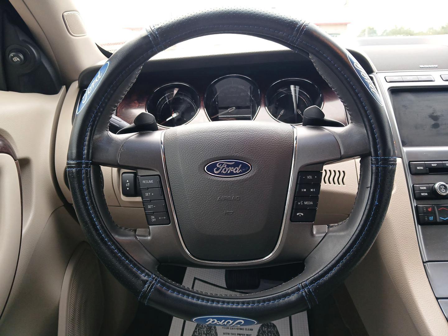 2011 White Platinum Metallic Ford Taurus Limited FWD (1FAHP2FW9BG) with an 3.5L V6 DOHC 24V engine, 6-Speed Automatic transmission, located at 1099 N County Rd 25A, OH, 45373, (937) 908-9800, 40.057079, -84.212883 - Photo#15