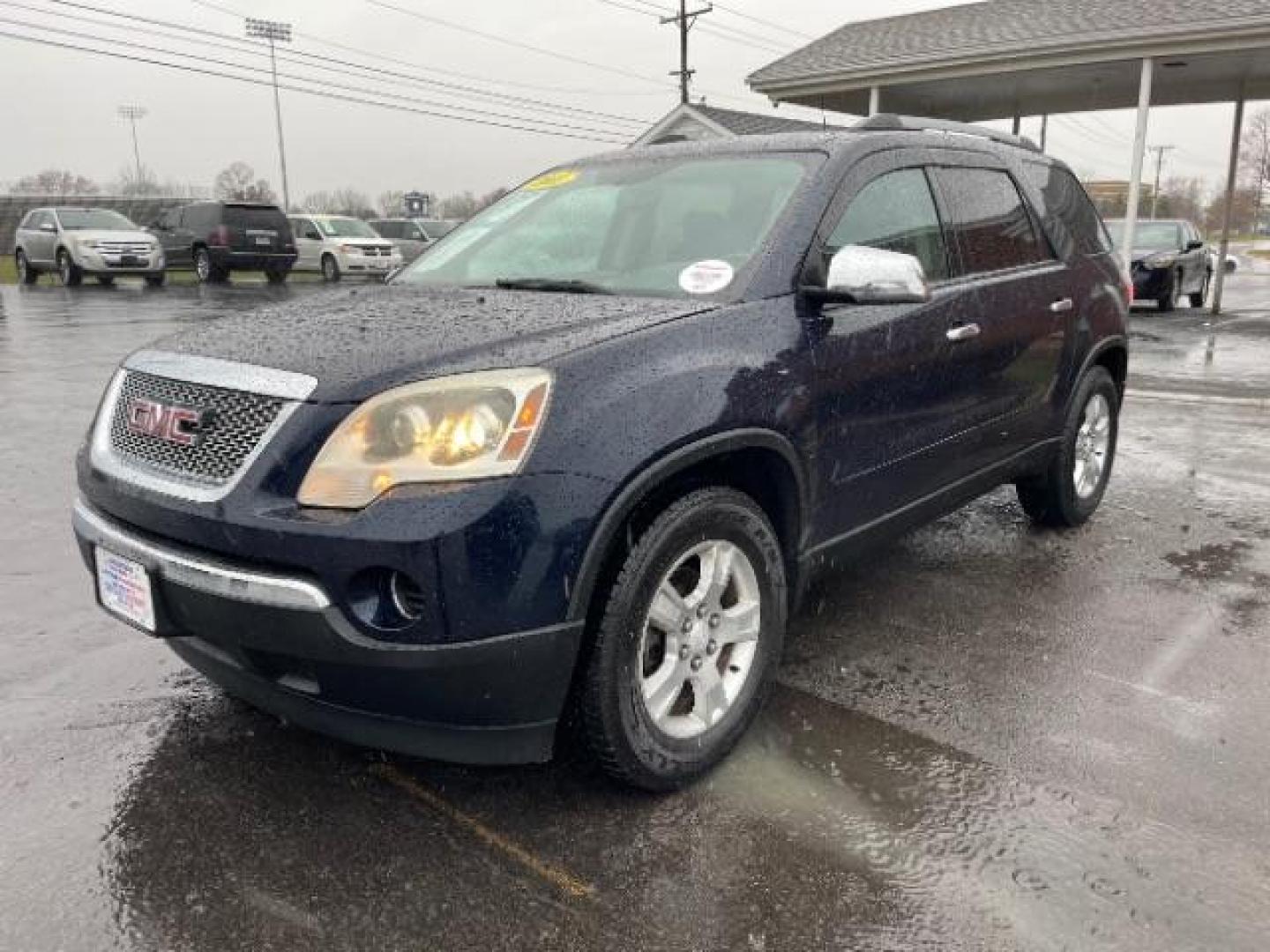 2011 Dark Blue Metallic GMC Acadia SLE-1 AWD (1GKKVNED3BJ) with an 3.6L V6 DOHC 24V engine, 6-Speed Automatic transmission, located at 4508 South Dixie Dr, Moraine, OH, 45439, (937) 908-9800, 39.690136, -84.216438 - Photo#1